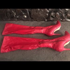 Skin tight over the knee heel boot